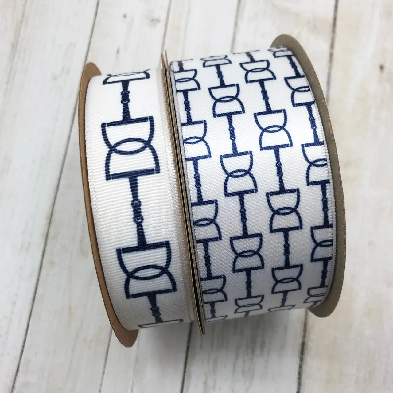 Snaffle bit ribbon with navy blue bits printed on 7/8" white single grosgrain